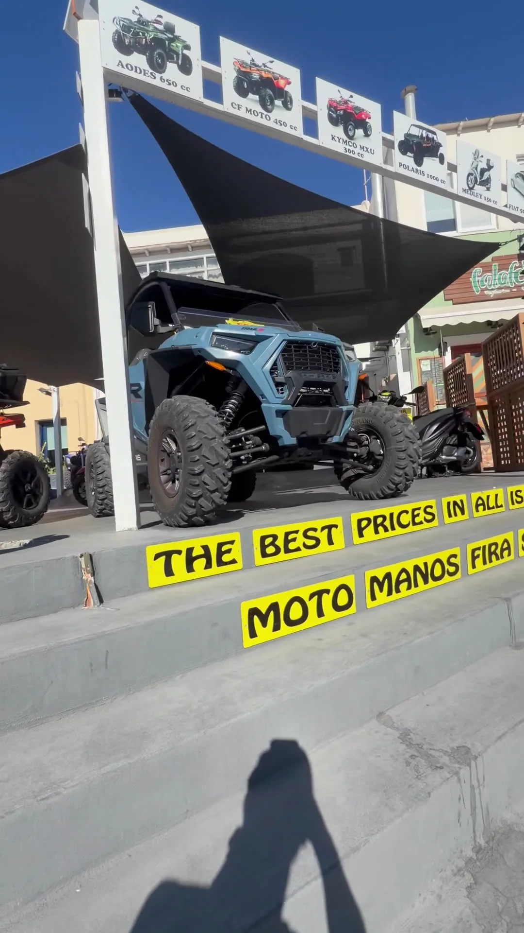 Main view at Moto Manos Fira rental car atv buggy scooter Santorini — travel photo